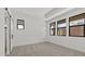 Spacious bedroom with decorative trim and large windows, providing ample natural light and a cozy atmosphere at 20332 W Sells Dr, Buckeye, AZ 85396