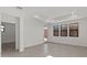 Expansive living room with contemporary flooring, ample natural light, and an inviting atmosphere for relaxation and entertainment at 20332 W Sells Dr, Buckeye, AZ 85396