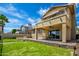 Two story home with covered patio, balcony, well maintained lawn and outdoor patio at 20713 N 56Th Ave, Glendale, AZ 85308