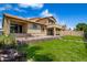 Two story home with a well maintained lawn and outdoor patio at 20713 N 56Th Ave, Glendale, AZ 85308