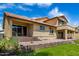 Two story home with a well maintained lawn and outdoor patio at 20713 N 56Th Ave, Glendale, AZ 85308