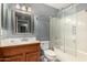 Bathroom featuring a vanity and shower-tub combination with updated fixtures at 20713 N 56Th Ave, Glendale, AZ 85308