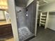 Beautiful bathroom featuring updated shower with stylish tile work and shelving at 20713 N 56Th Ave, Glendale, AZ 85308
