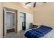 Bedroom boasts a closet, desk space, neutral paint, and great natural light at 20713 N 56Th Ave, Glendale, AZ 85308
