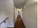Hallway features hardwood floors and a ceiling fan at 20713 N 56Th Ave, Glendale, AZ 85308