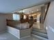 Open kitchen with wood cabinets, granite counters, and stainless steel appliances at 20713 N 56Th Ave, Glendale, AZ 85308
