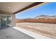 Covered patio looks out to the spacious backyard with potential for landscaping at 22825 E Alyssa Rd, Queen Creek, AZ 85142
