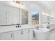 Bright bathroom featuring a freestanding tub, double vanity, and a separate shower at 22825 E Alyssa Rd, Queen Creek, AZ 85142