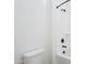 Minimalist bathroom with a toilet, shower and modern black fixtures at 22825 E Alyssa Rd, Queen Creek, AZ 85142