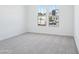 Bedroom featuring carpeted floors and a view of the street at 22825 E Alyssa Rd, Queen Creek, AZ 85142