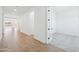 Bright hallway features modern tile flooring and neutral walls at 22825 E Alyssa Rd, Queen Creek, AZ 85142