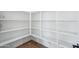 Walk-in pantry featuring ample shelving space for organized storage at 22825 E Alyssa Rd, Queen Creek, AZ 85142