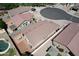 Aerial view of a home's backyard featuring a pool, patio, and low maintenance landscaping at 2397 E Winchester Pl, Chandler, AZ 85286