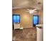 Cozy bedroom with vaulted ceilings, carpet flooring, and blue curtains at 2397 E Winchester Pl, Chandler, AZ 85286