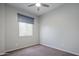 Comfortable bedroom features a window with blinds for natural light at 2644 S Dock St, Gilbert, AZ 85295