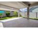 Covered patio with tiled flooring provides the perfect outdoor space for relaxing or entertaining at 2644 S Dock St, Gilbert, AZ 85295