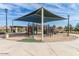 Neighborhood playground featuring shade structure, climbing equipment, and picnic area at 2644 S Dock St, Gilbert, AZ 85295