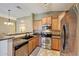 Modern kitchen with stainless steel appliances, granite countertops, and ample cabinetry at 2725 E Mine Creek Rd # 2058, Phoenix, AZ 85024