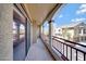 Outdoor patio with a wrought iron railing overlooking the neighborhood at 2725 E Mine Creek Rd # 2058, Phoenix, AZ 85024