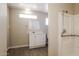 The bathroom features a shower, vanity, and neutral walls, creating a functional space at 3045 W Palmaire Ave, Phoenix, AZ 85051