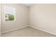 Bright bedroom featuring tile flooring, neutral walls, and a window allowing natural light at 3072 E Appaloosa Rd, Gilbert, AZ 85296