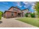 Charming two-story home with a well-manicured lawn and paver driveway at 3072 E Appaloosa Rd, Gilbert, AZ 85296