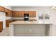 Well-equipped kitchen with stainless steel appliances, granite countertops, and a functional island at 3072 E Appaloosa Rd, Gilbert, AZ 85296