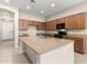 Beautiful kitchen with granite countertops, stainless steel sink, and ample cabinet space at 3072 E Appaloosa Rd, Gilbert, AZ 85296