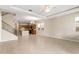 Spacious open floor plan with connecting kitchen, staircase and tile floor at 3072 E Appaloosa Rd, Gilbert, AZ 85296