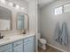 Stylish bathroom featuring double sinks with modern fixtures, and a separate toilet room at 3114 S Eugene --, Mesa, AZ 85212