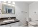 Bathroom featuring a silver-framed mirror and chrome hardware at 3601 N 12Th St, Phoenix, AZ 85014