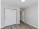 A bright bedroom with wood flooring and double door closet at 3601 N 12Th St, Phoenix, AZ 85014