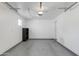 Bright garage with epoxy flooring and a storage shelf at 3601 N 12Th St, Phoenix, AZ 85014