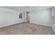 Bright living room with wood-look floors, fresh paint, and natural light at 3601 N 12Th St, Phoenix, AZ 85014