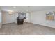 Open concept living and dining area with wood-look tile and modern finishes at 3601 N 12Th St, Phoenix, AZ 85014