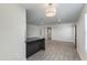 Stylish open-concept living area with tile flooring, and modern lighting at 3601 N 12Th St, Phoenix, AZ 85014
