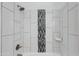 Modern shower with mosaic stripe and tiled walls at 3601 N 12Th St, Phoenix, AZ 85014
