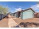 Street view showing multiple homes with similar architecture and landscaping at 3645 N 69Th Ave # 12, Phoenix, AZ 85033