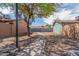 Picturesque walkway shaded by mature trees, connecting homes in a peaceful community at 3645 N 69Th Ave # 12, Phoenix, AZ 85033
