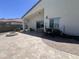 Covered patio with travertine pavers, a built-in fire pit, and BBQ area creates a fantastic outdoor living space at 514 E Pearce Rd, Phoenix, AZ 85042