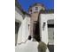 Unique front door with architectural detail set in a brick alcove at 514 E Pearce Rd, Phoenix, AZ 85042
