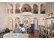 Dramatic living room featuring a balcony, soaring ceilings, and lots of natural light at 514 E Pearce Rd, Phoenix, AZ 85042