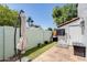 Outdoor patio featuring tile flooring, an umbrella, and an outdoor kitchen area at 5350 N 3Rd Ave, Phoenix, AZ 85013