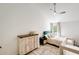 Cozy bedroom with vaulted ceiling, modern fan, and stylish furnishings at 5350 N 3Rd Ave, Phoenix, AZ 85013
