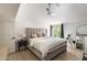 Serene bedroom with high ceilings, neutral tones, and lots of natural light from the window at 5350 N 3Rd Ave, Phoenix, AZ 85013