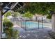 Community pool enclosed by black metal fence, set in a well-maintained outdoor common area at 5350 N 3Rd Ave, Phoenix, AZ 85013