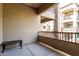 Large open air balcony with a bench offers ample space for outdoor relaxation at 5450 E Deer Valley Dr # 3003, Phoenix, AZ 85054