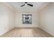 Spacious bedroom has light wood flooring and a window with nice natural light at 5450 E Deer Valley Dr # 3003, Phoenix, AZ 85054