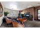 Community living room features comfortable seating, fireplace, and elegant decor at 5450 E Deer Valley Dr # 3003, Phoenix, AZ 85054