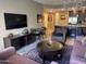 Comfortable living room with an open floor plan, featuring a dining area and modern kitchen at 5450 E Deer Valley Dr # 3183, Phoenix, AZ 85054